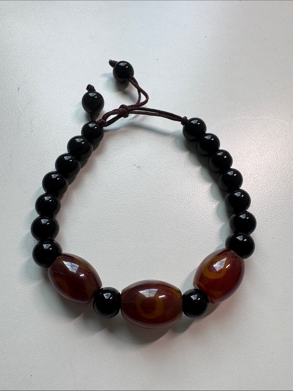 Evil Eye Beaded Stretch Bracelet with Black and Amber Beads